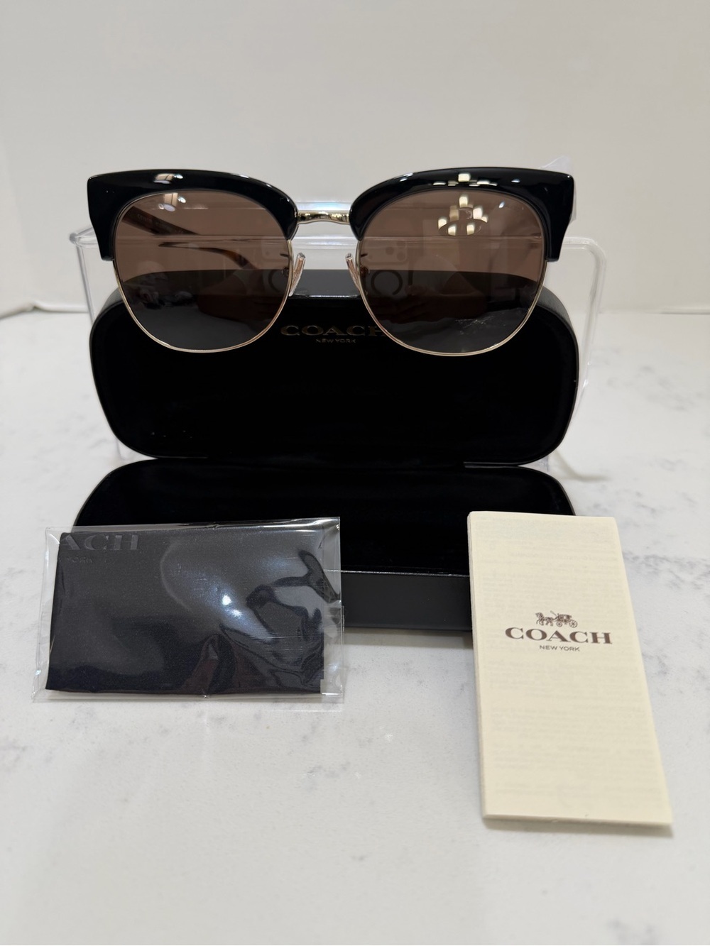 Coach Black Frame Sunglasses with Gold Trim and Brown Lenses